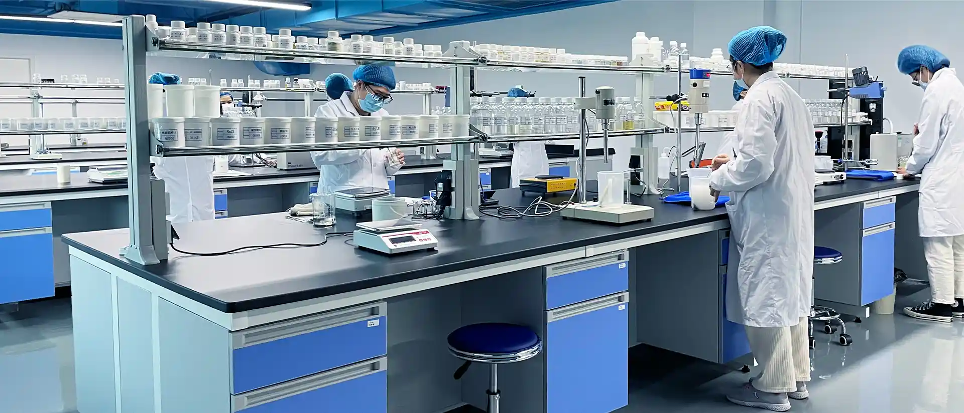 Qiaomei R&D team in the laboratory